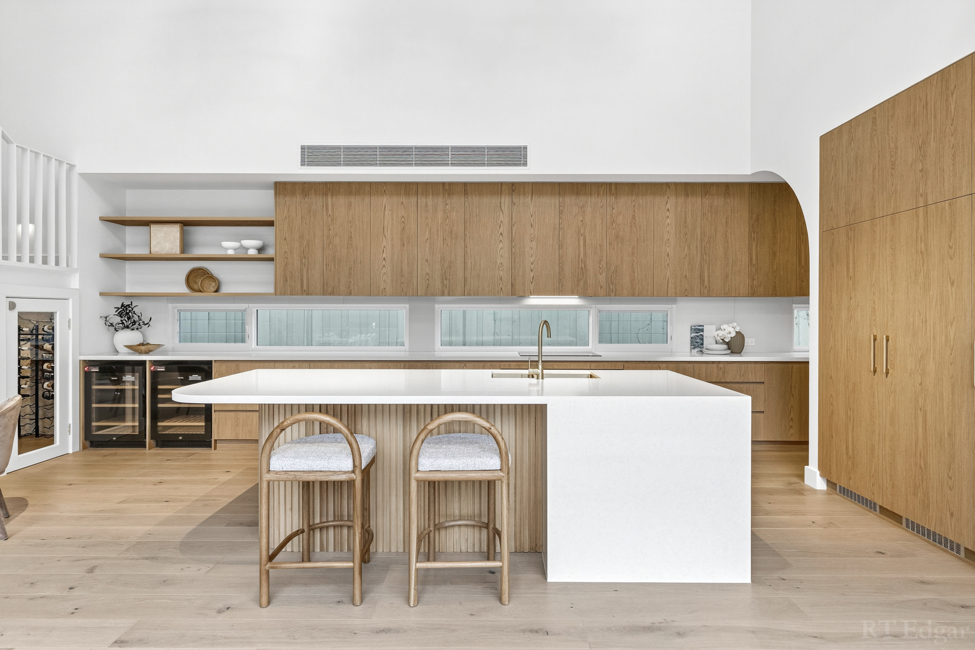 Thorn Street kitchen with timber cabinetry and a white island