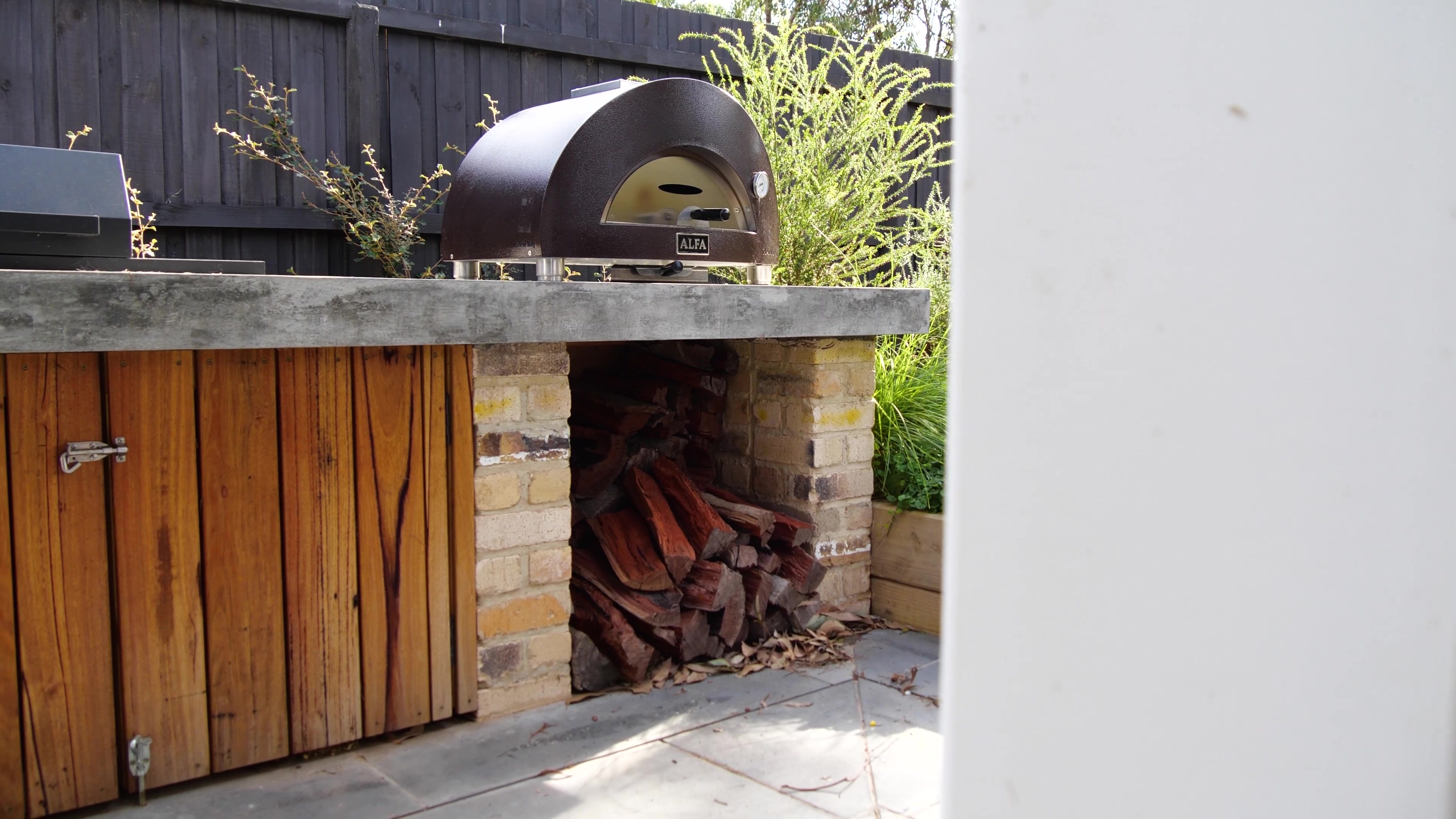 Shell Road covered outdoor entertaining area with a pizza oven