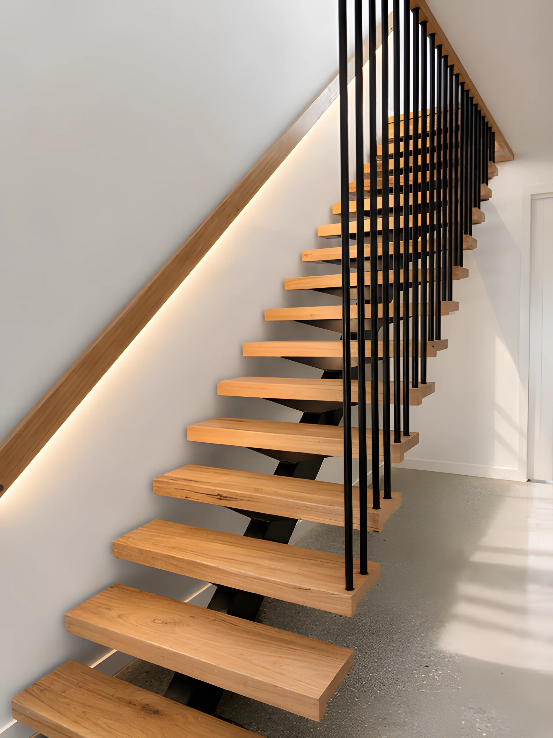 Midden Terrace staircase with pale timber steps and a softly curved wall